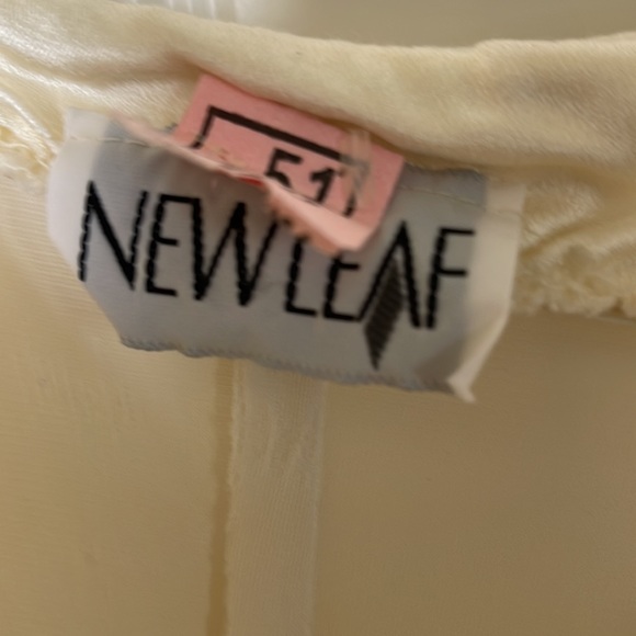 Ivory spaghetti strap asymmetrical w/zipper on left side with rose complimenting - Picture 4 of 5